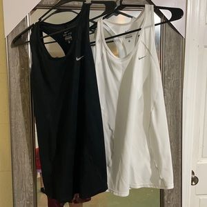 2 women’s Nike workout tanks dry fit